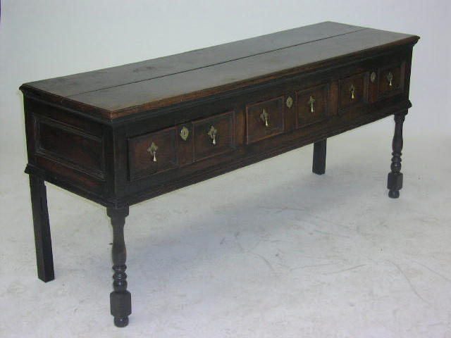 A 17th century oak dresser base,