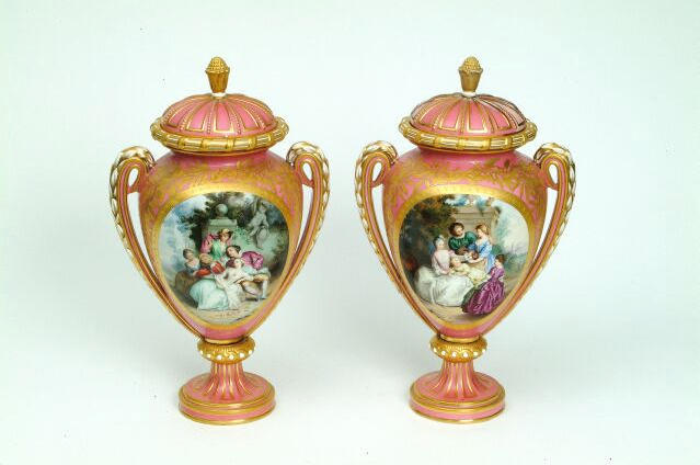 A pair of Royal Worcester vases and covers