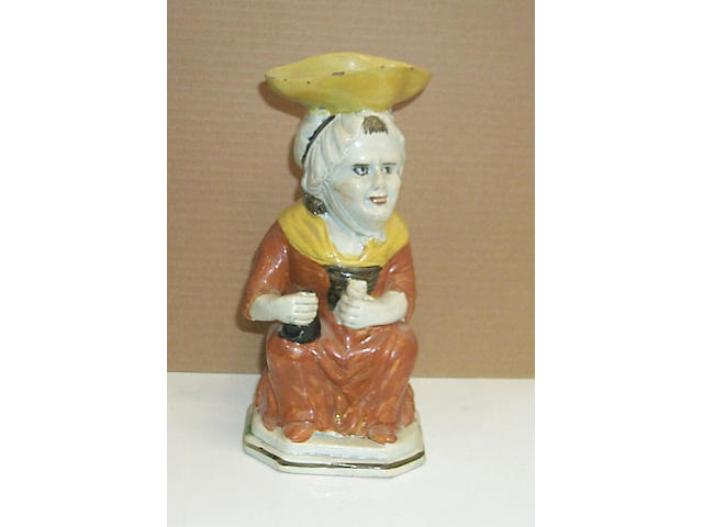An enamelled pearware Toby jug of Martha Gunn, circa 1800,