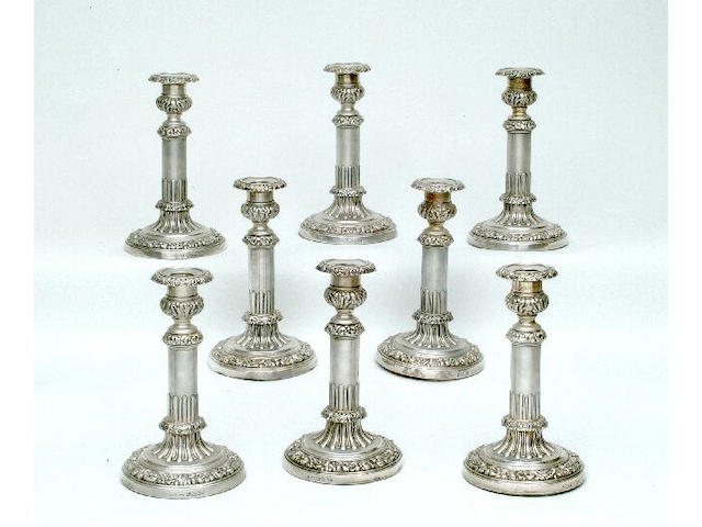 A set of eight George III telescopic candlesticks By John and Thomas Settle, Sheffield 1818