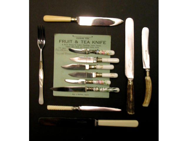 A group of cutlery, some set up by Fred James,