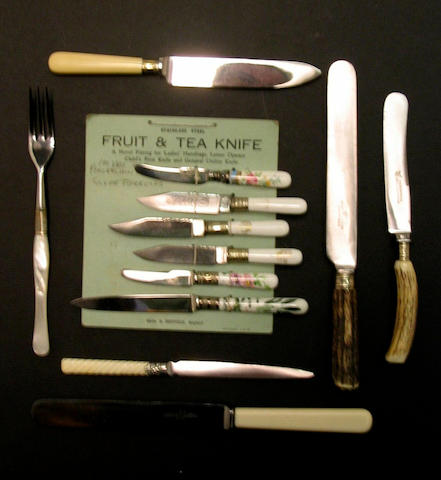 A group of cutlery, some set up by Fred James,