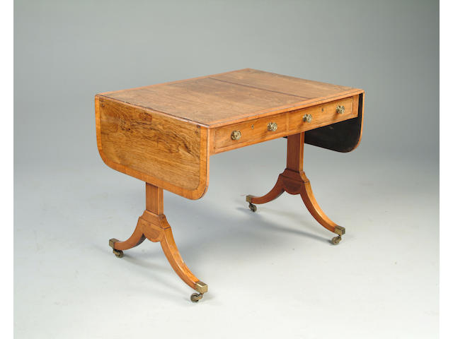 A Regency rosewood and satinwood banded sofa table
