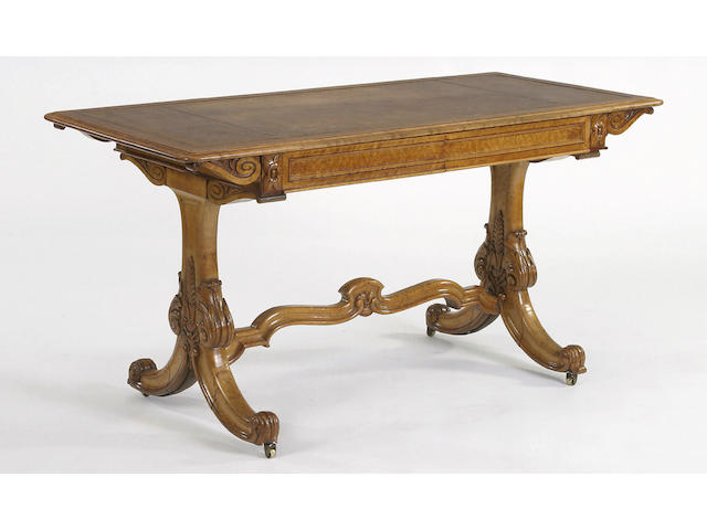 An early Victorian maple and burr maple library writing table, by Taprell and Holland, designed by Charles Barry, 148cm wide, 68cm deep, 75cm high.  one drawer stamped W. Priest, 182 Tudor St, Blackfriars and with an ink stamp to one drawer From Taprell Holland and Sons, 19 Marylebone Street ... London