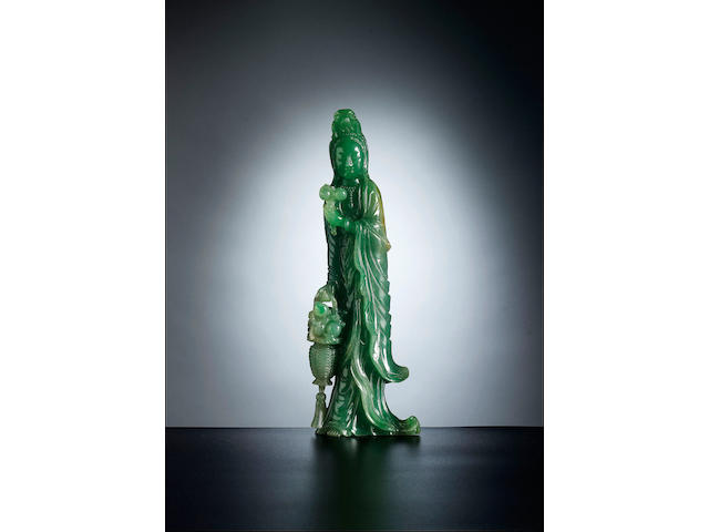 A very fine carved jadeite figure of Guanyin Late Qing Dynasty