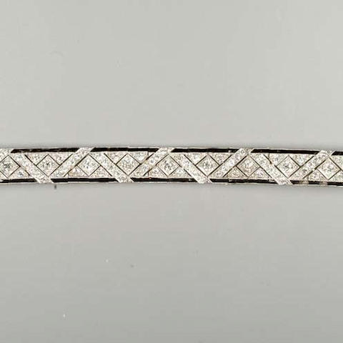An art deco onyx and diamond bracelet