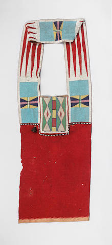 A Large Plains Hide and Red Stroud Beaded Bandoleer Bag
