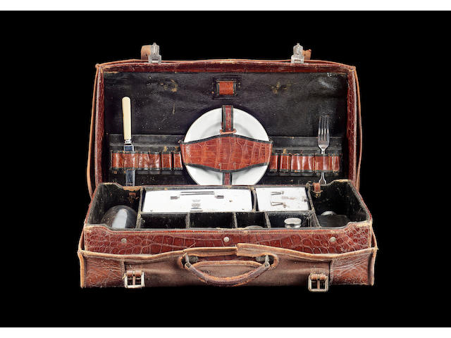 A CROCODILE HIDE PICNIC CASE BY A BARRETT & SONS (MAKERS, 63 & 64 PICCADILLY, LONDON)