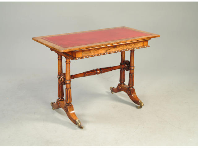 A George IV figured walnut writing table,
