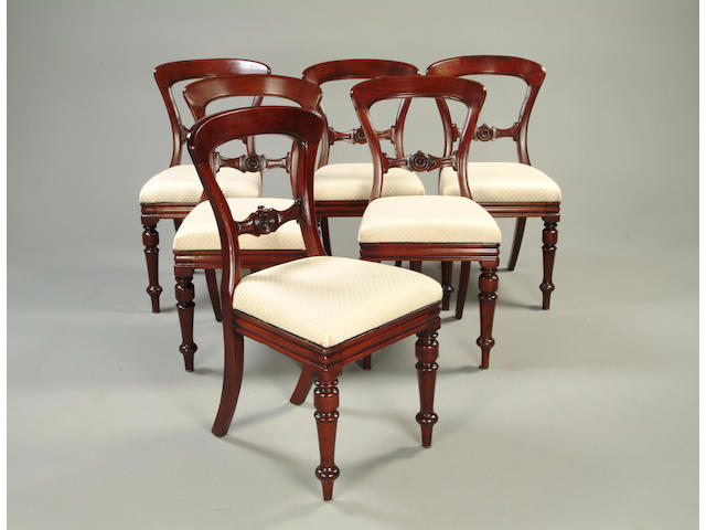 A set of eight Victorian mahogany dining chairs