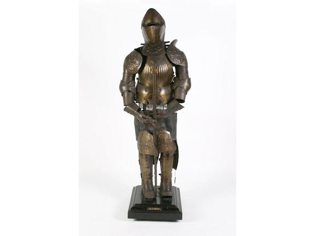 A 19th Century model of a Maximillion Period (1500 - 1525) suit of armour and various swords.
