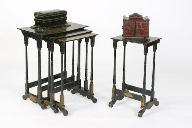 A quartetto nest of Victorian black lacquered and painted tables,