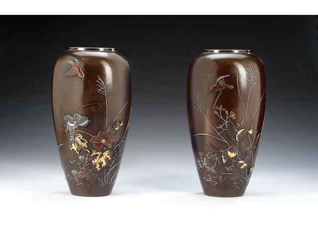 A pair of Japanese bronze vases,