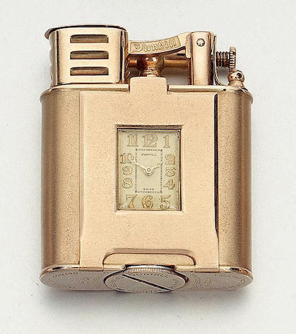 Dunhill. A rare 9ct gold watch lighter London Import mark for 1929, No.753