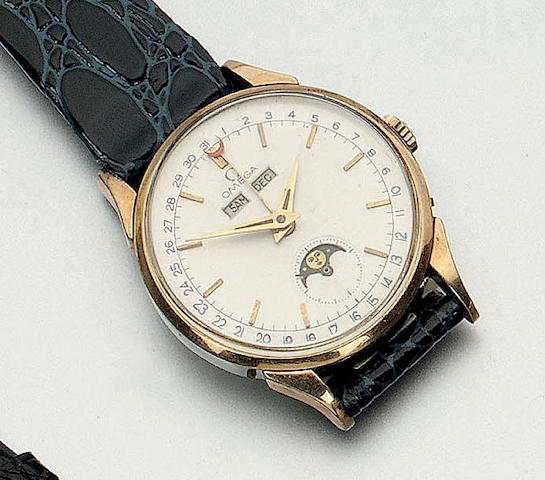Omega. A gold plated triple calendar wristwatch1950s