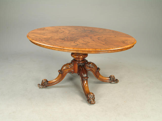 A Victorian walnut oval loo table