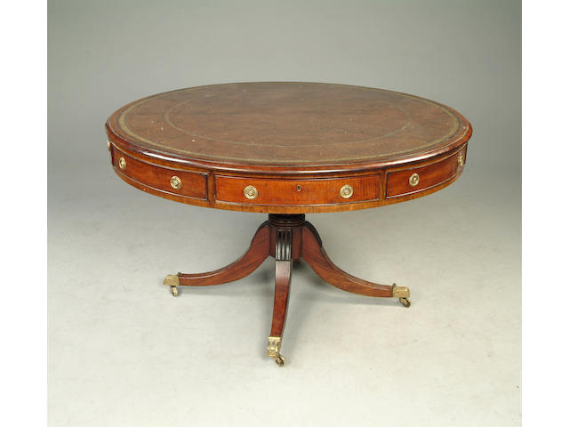 A Regency mahogany drum top library table