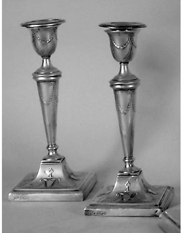 A pair of candlesticks, Mappin & Webb, Sheffield 1909,