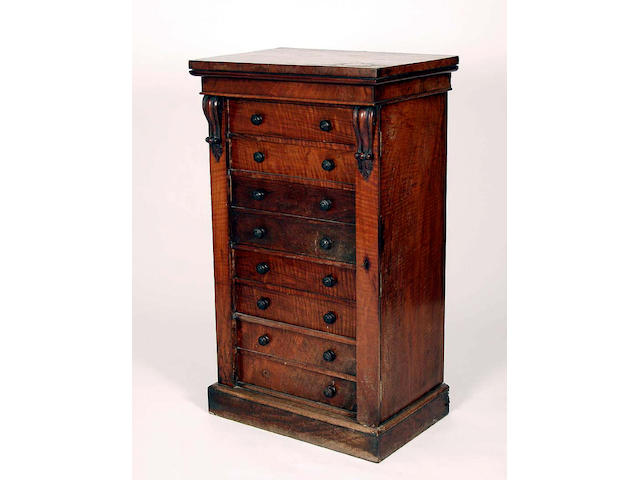 A Victorian walnut Wellington chest of drawers,