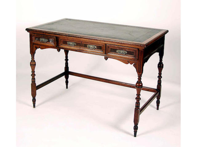A late Victorian mahogany writing table,