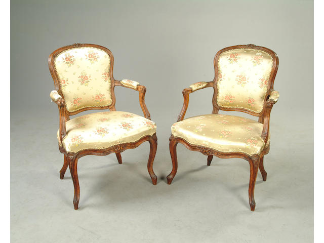 A pair of Louis XV beechwood fauteuils