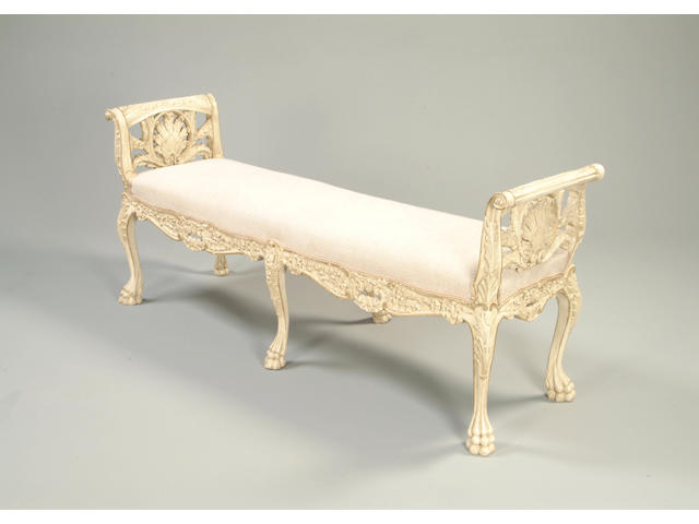 A Louis XVI style cream painted window seat