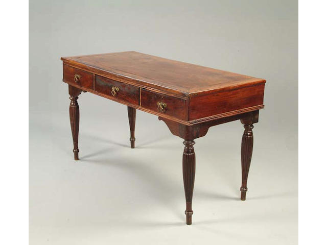 A 19th century teak writing table