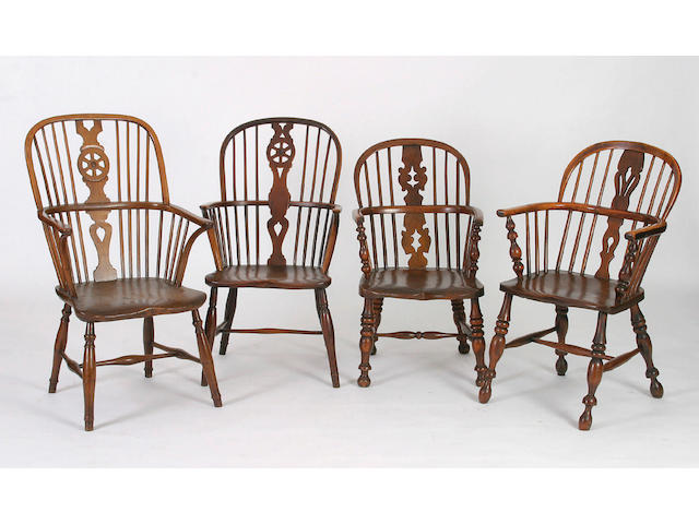 A 19th Century fruitwood, ash and elm high back windsor,