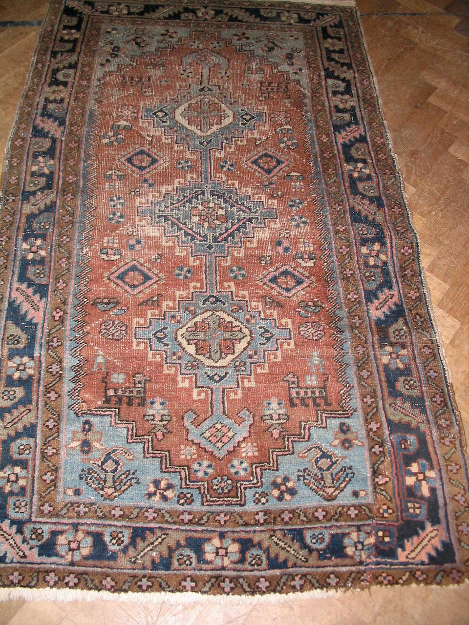 A Karadja rug North West Persia, together with two Hamadan rugs, (3)