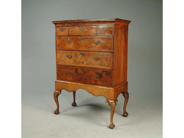 An early 18th Century walnut chest on stand