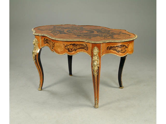 A 19th century kingwood, marquetry inlaid and gilt metal mounted bureau plat