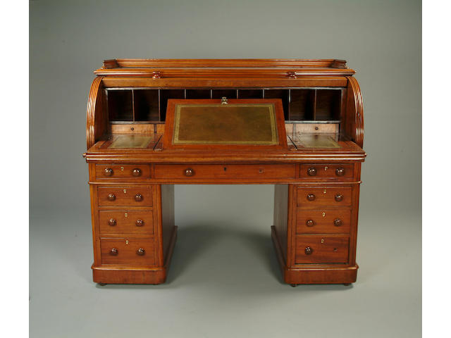 A Victorian mahogany cylinder pedestal desk