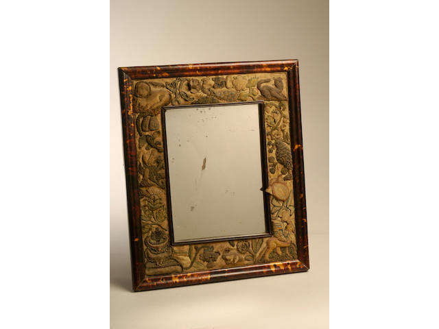 A 17th Century 'stump' work mirror frame,