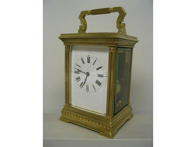 A French brass carriage clock,