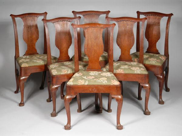A fine set of six George II mahogany dining chairs,