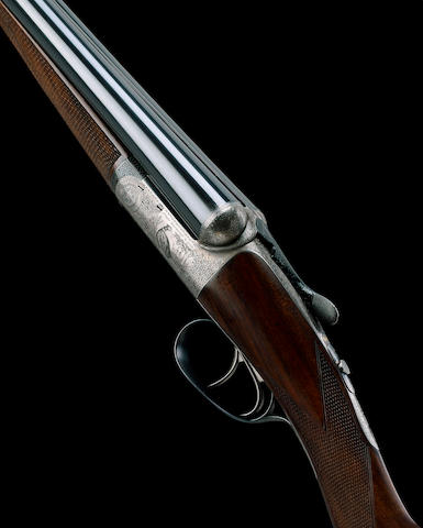 A FINE LIGHTWEIGHT 12-BORE SELF-OPENING ROUND-ACTION EJECTOR GUN BY J. DICKSON, NO. 7110 In its brass-mounted leather case
