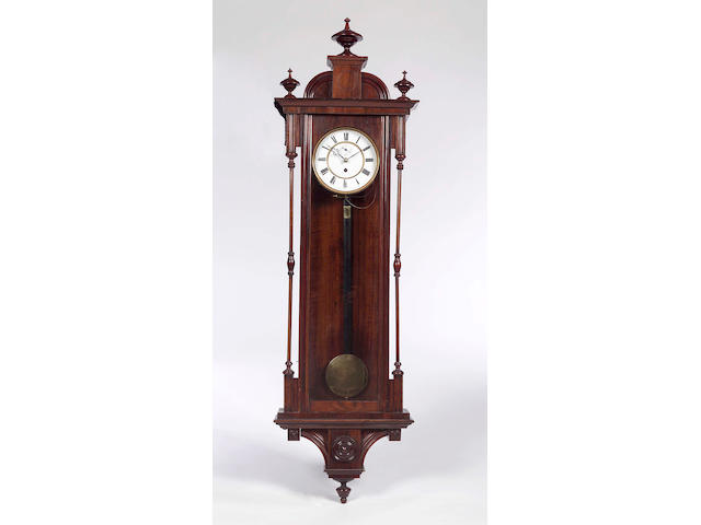 A late 19th century rosewood and simulated rosewood 'Vienna' wall clock,