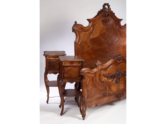 A late 19th century French carved walnut three piece bedroom suite,