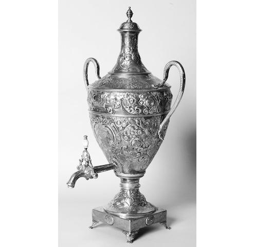 A George III samovar apparently unmarked to the body, cover with makers mark, C.W.? and lion passant, spout marked with lion passant, duty mark and makers mark S.D.,