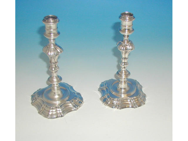 A pair of George II cast candlesticks, by James Gould, 1744,
