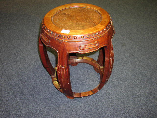 A carved hardwood jardiniere stand,