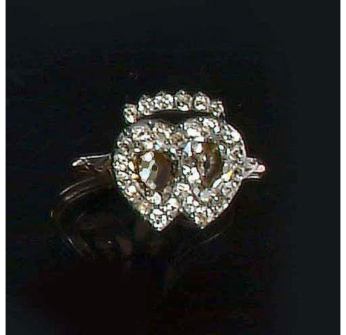 An early 19th century diamond double heart ring