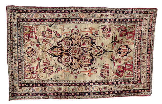 A Kirman rug South East Persia, 211 x 134 cm