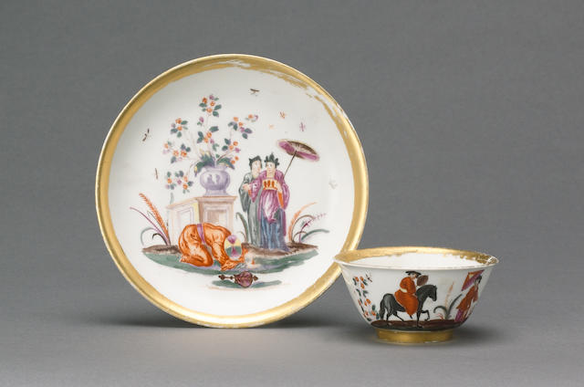 A B&#246;ttger teabowl and saucer with hausmaler decoration circa 1720, the decoration slightly later