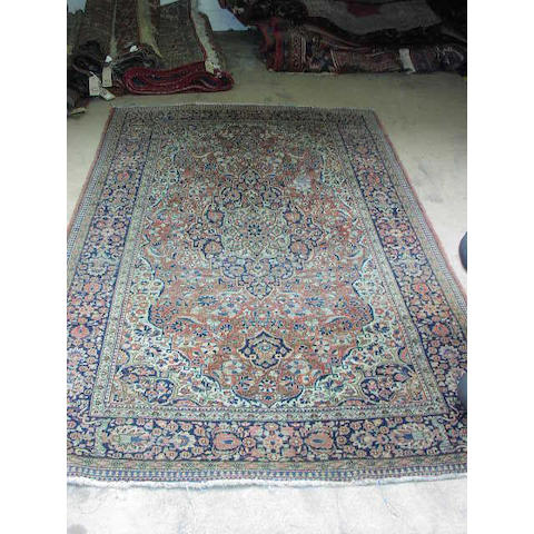 A Kashan rug, 1.33 x 2.16m
