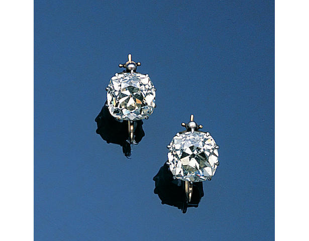 A pair of late Victorian diamond single-stone earpendants