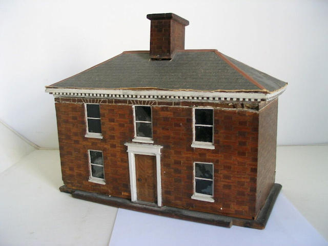 A wooden model of a house