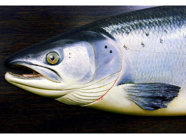 A fine carved and painted half block salmon trophy,