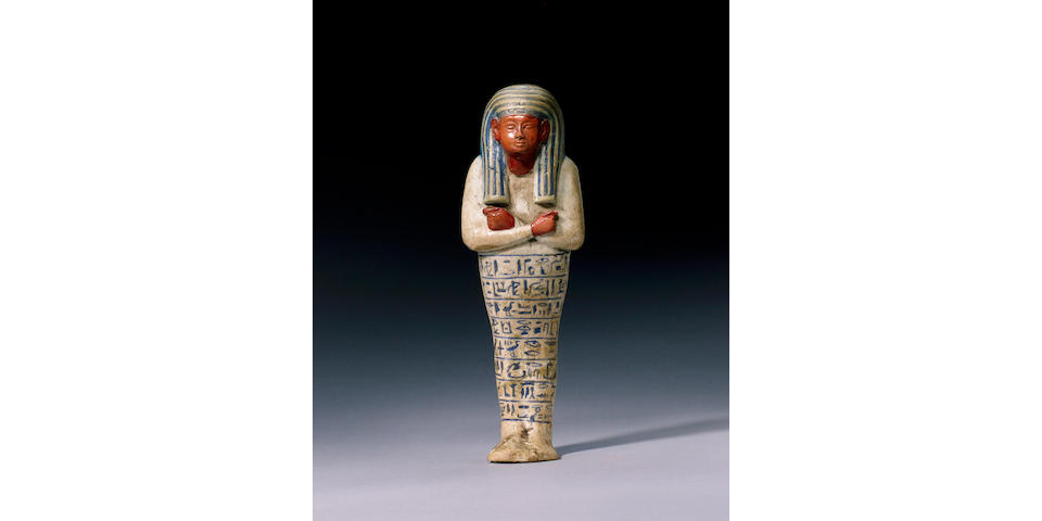 An Egyptian white glazed composition shabti of Ay