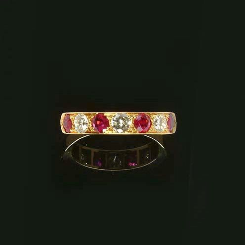 A ruby and diamond ring